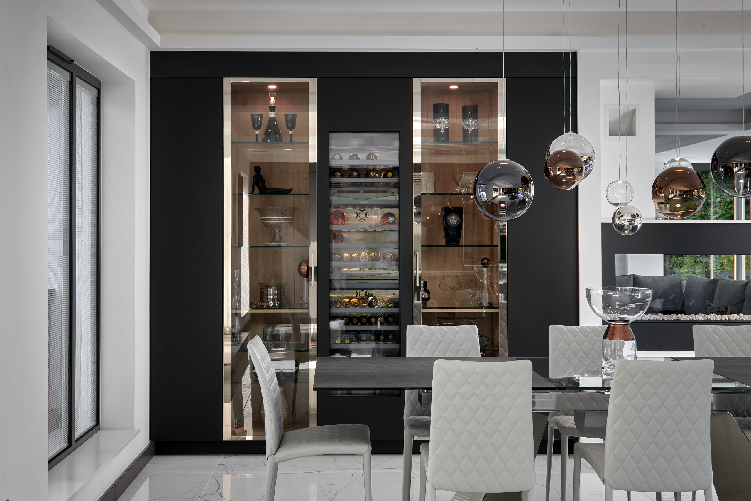 Modern Open Plan Kitchen in Hampshire with Chrome & Glass Wine cabinets | Gaggenau Wine Fridge | The Myers Touch